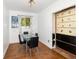 Cozy dining area with a modern glass table and elegant chandelier lighting at 131 N Central Ave, Apopka, FL 32703