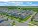Aerial view of a residential area showcasing well-maintained homes and landscaping at 1378 Roxy Ln, Winter Garden, FL 34787