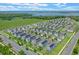 Primary-planned community showcasing houses with green landscaping, ponds, and walking trails at 1378 Roxy Ln, Winter Garden, FL 34787