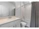 Clean, well-lit bathroom with a shower/tub combo and a vanity with quartz counters at 1378 Roxy Ln, Winter Garden, FL 34787