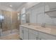 Bright bathroom with double vanity and glass shower at 1378 Roxy Ln, Winter Garden, FL 34787