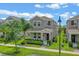 Charming two-story home with manicured lawn, landscaping, and inviting front porch at 1378 Roxy Ln, Winter Garden, FL 34787