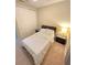 Serene bedroom with a comfortable bed, neutral carpet, and minimalist decor for a relaxing atmosphere at 14164 Swanley St, Orlando, FL 32832
