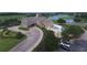 Aerial view of the clubhouse and surrounding landscaping and golf course at 14164 Swanley St, Orlando, FL 32832