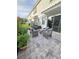 Paver patio area with outdoor seating and lush landscaping at 14164 Swanley St, Orlando, FL 32832