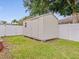 A storage shed in the backyard offers extra space for tools and outdoor equipment at 14322 Pine Cone Trl, Clermont, FL 34711