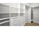 Organized walk-in closet offering ample storage with built-in shelving and drawers at 1441 Foxtail Ct, Lake Mary, FL 32746