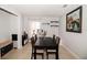 Bright dining area with tile flooring, contemporary decor, and a view of the backyard at 1470 Daniels Cove Dr, Winter Garden, FL 34787