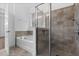 Bathroom featuring a shower and separate bathtub, complemented by neutral tile and fixtures at 15500 Fountain Cove Ct, Winter Garden, FL 34787