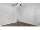 Bright bedroom with hardwood floors, ceiling fan, and closet at 15500 Fountain Cove Ct, Winter Garden, FL 34787