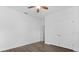 A bright bedroom featuring wood flooring and a closet at 15500 Fountain Cove Ct, Winter Garden, FL 34787