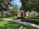A charming clubhouse nestled among lush greenery and manicured landscaping offers a welcoming community space at 15500 Fountain Cove Ct, Winter Garden, FL 34787