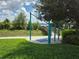 Outdoor workout area with exercise equipment, offering residents a convenient way to stay active with scenic lake views at 15500 Fountain Cove Ct, Winter Garden, FL 34787