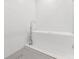 Contemporary bathroom featuring a freestanding tub, modern faucet, and white tile at 15942 Vetta Dr, Bella Collina, FL 34756