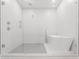 Sleek bathroom with a modern freestanding tub, shower, and stylish fixtures at 15942 Vetta Dr, Bella Collina, FL 34756