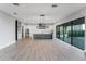 Open-concept kitchen with stainless steel appliances, granite countertops, and a large island at 15942 Vetta Dr, Bella Collina, FL 34756