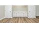 Basement storage featuring built in cabinets and modern flooring at 1660 Justin Matthew Way, St Cloud, FL 34771