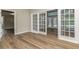 Living room with lots of natural light and access to the pool deck at 1660 Justin Matthew Way, St Cloud, FL 34771