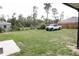Expansive back yard with truck and trailer perfect for outdoor activities and storage at 16863 Sw 29Th Terrace Rd, Ocala, FL 34473
