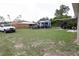 Spacious back yard with a storage shed perfect for outdoor activities and storage at 16863 Sw 29Th Terrace Rd, Ocala, FL 34473