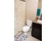 Bathroom with shower and vanity featuring a granite countertop at 16863 Sw 29Th Terrace Rd, Ocala, FL 34473