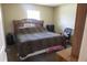 Bedroom featuring a television, office chair, and leopard print bedding at 16863 Sw 29Th Terrace Rd, Ocala, FL 34473