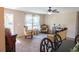 Inviting living area with natural light, plush carpet, and vintage-style furnishings at 16863 Sw 29Th Terrace Rd, Ocala, FL 34473