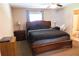 Comfortable main bedroom with a ceiling fan and ensuite bathroom at 16863 Sw 29Th Terrace Rd, Ocala, FL 34473