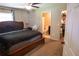 Comfortable main bedroom with a ceiling fan and ensuite bathroom at 16863 Sw 29Th Terrace Rd, Ocala, FL 34473
