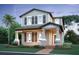 Charming two-story home featuring classic architecture, inviting front porch, and well-maintained landscaping at 17359 Beachgrass Aly, Winter Garden, FL 34787