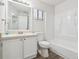 Bathroom featuring vanity, toilet, mirror and shower with natural light at 1802 Waterbeach Ct, Apopka, FL 32703