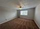 Bedroom featuring neutral paint, ceiling fan, and a window for natural light at 1922 Conway Rd # 1922, Orlando, FL 32812