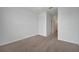 Bedroom featuring a neutral carpet, white walls, and a doorway at 200 Feltrim Reserve Blvd, Davenport, FL 33837