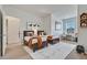Bright bedroom with two beds, a desk area, and decorative rug at 200 Feltrim Reserve Blvd, Davenport, FL 33837