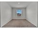 Bright bedroom with neutral carpet and natural light from the window at 200 Feltrim Reserve Blvd, Davenport, FL 33837