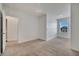 Bright bedroom with neutral carpet, white walls, and natural light from the window at 200 Feltrim Reserve Blvd, Davenport, FL 33837