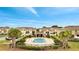 Community pool area surrounded by a black fence and manicured landscape, perfect for relaxation and recreation at 200 Feltrim Reserve Blvd, Davenport, FL 33837
