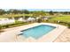 Refreshing swimming pool featuring tiled borders and steps for easy access, ideal for community enjoyment at 200 Feltrim Reserve Blvd, Davenport, FL 33837