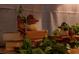 Unique home decor with detailed, nature-themed figurines and stacked books at 2041 Lacie Jo Ln, Kissimmee, FL 34743