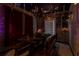 Unique dining room with rustic table, bench seating, and decorative chandelier at 2041 Lacie Jo Ln, Kissimmee, FL 34743