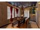 Dining room with floating candle decor, wooden table with bench seating, and castle themed banners at 2041 Lacie Jo Ln, Kissimmee, FL 34743