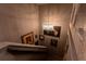Unique stairwell leading down with eye catching artwork lining the walls at 2041 Lacie Jo Ln, Kissimmee, FL 34743