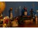 Detailed view of antique bottles, books, and a globe creating a unique, curated tabletop vignette at 2041 Lacie Jo Ln, Kissimmee, FL 34743