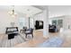 Open-concept living room with lots of natural light and neutral color palette at 2071 Remembrance Ave, St Cloud, FL 34769
