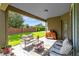 Back patio featuring ample seating, and space for a grill to enjoy outdoor living at 2071 Remembrance Ave, St Cloud, FL 34769