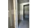 Unfinished bathroom featuring drywall and a doorway leading to an adjacent room at 2292 Broadbrook Drive, St Cloud, FL 34771