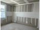 Bright bedroom with drywall, smooth ceilings, and a window framing the outdoors at 2292 Broadbrook Drive, St Cloud, FL 34771