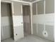 Bedroom with new drywall, electrical connections, and doorways at 2292 Broadbrook Drive, St Cloud, FL 34771