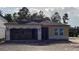 Exterior view of a home under construction, showcasing its frame, windows, and garage at 2292 Broadbrook Drive, St Cloud, FL 34771