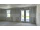 Interior view of a home under construction, featuring drywall, concrete floor and a window with exterior view at 2292 Broadbrook Drive, St Cloud, FL 34771